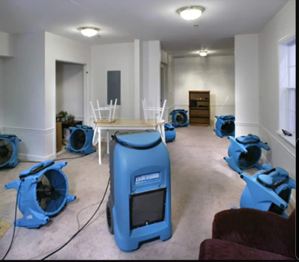Air movers and dehumidifier setup for Water Extraction & Removal in Elkton